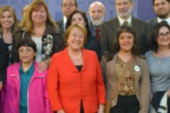 Dr. Alberto Minoletti junto a la Presidenta Michelle Bachelet.